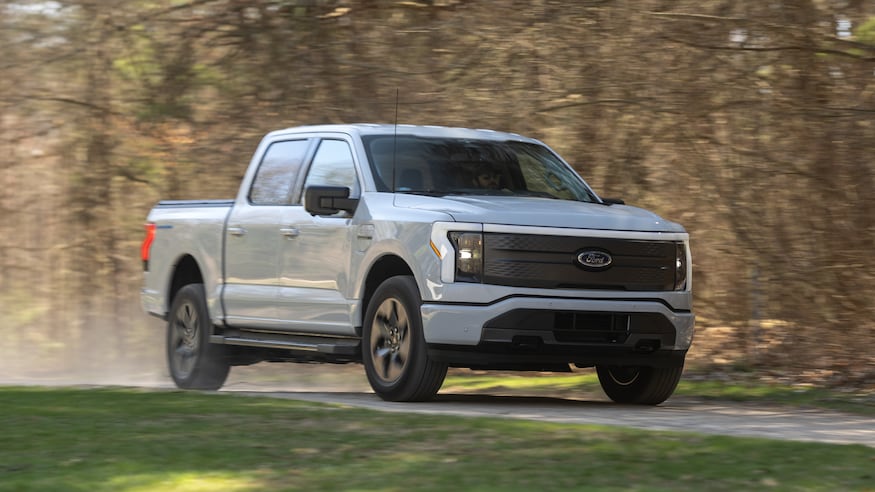 2023 Ford F 150 Lightning XLT LT3 front three quarters in motion 2