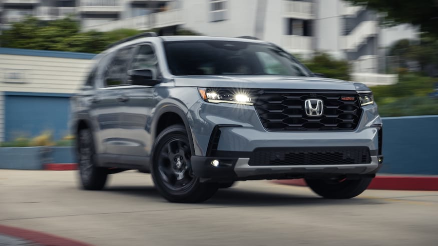 044 2023 Honda Pilot Trailsport Front three quarter in action